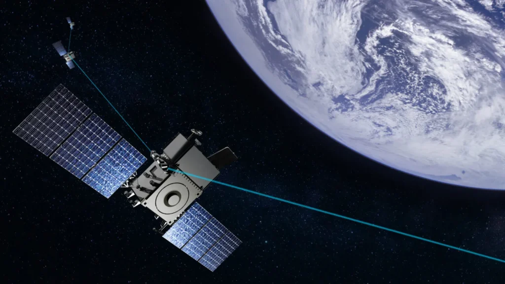 Satellite in space with earth beside it