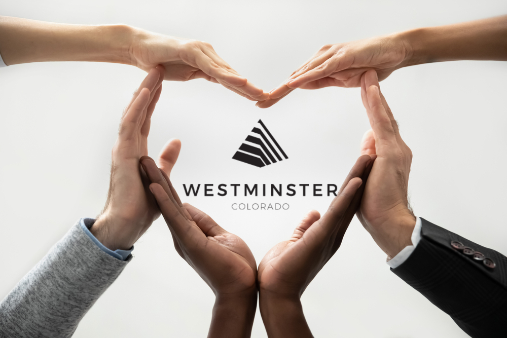 Hands in the shape of a heart with Westminster in the middle
