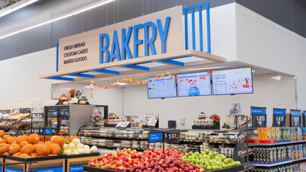 Bakery inside a store with fruits stacked in front