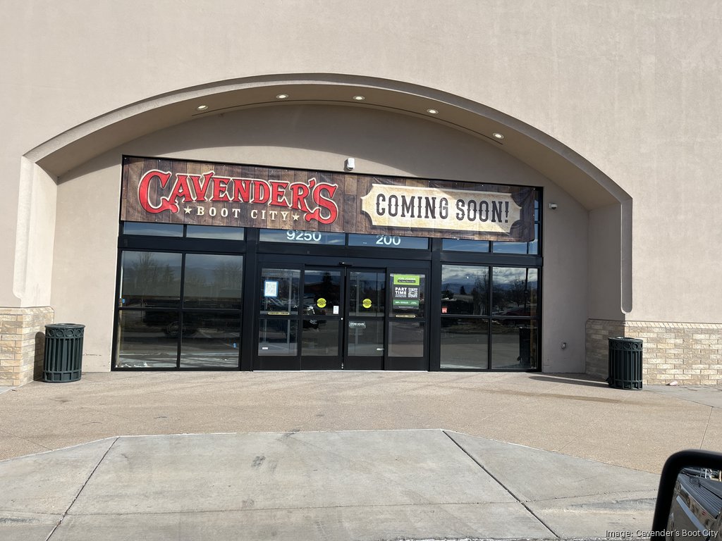 Storefront in a shopping center for Cavender's Boot City and front entrance doors