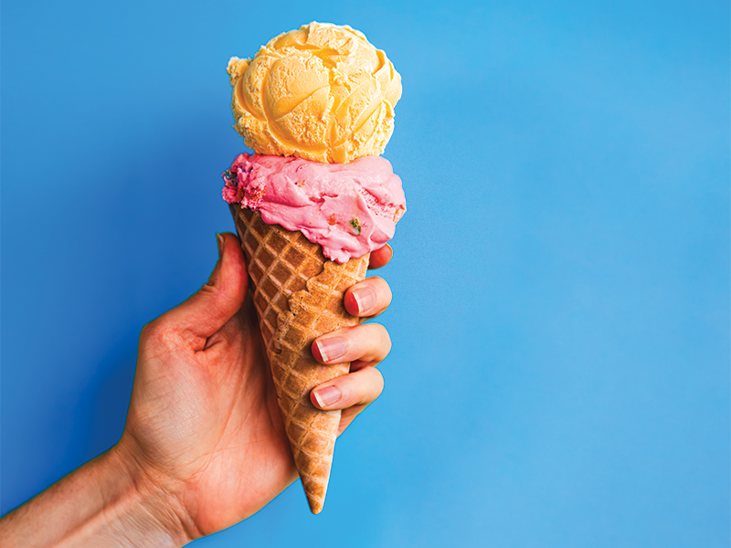 Hand holding an ice cream cone