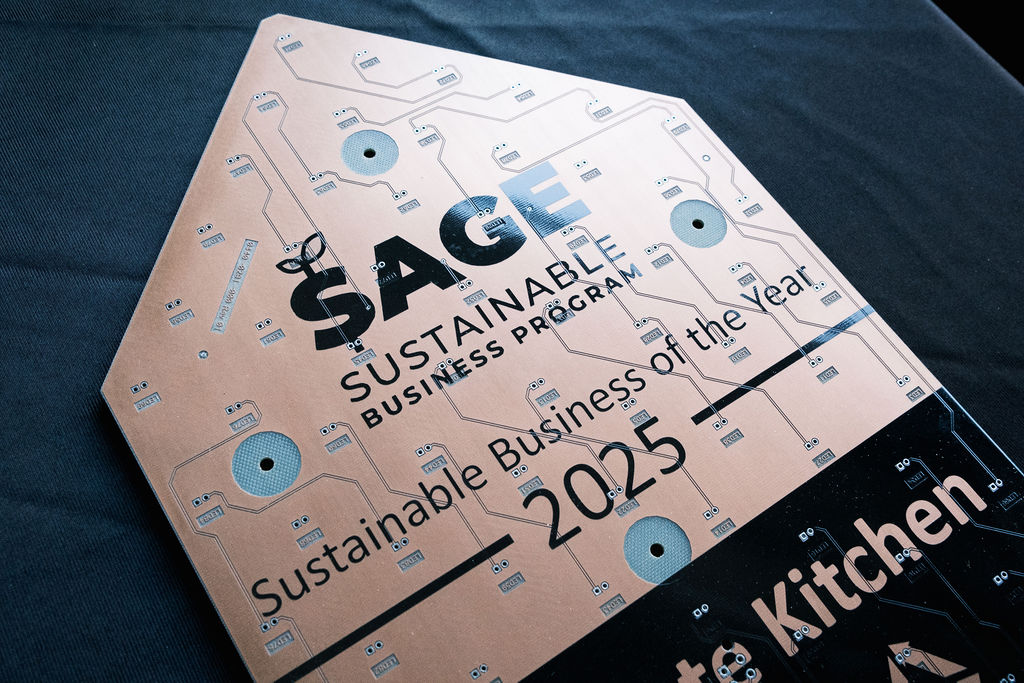 2025 SAGE Business Award sitting on a table